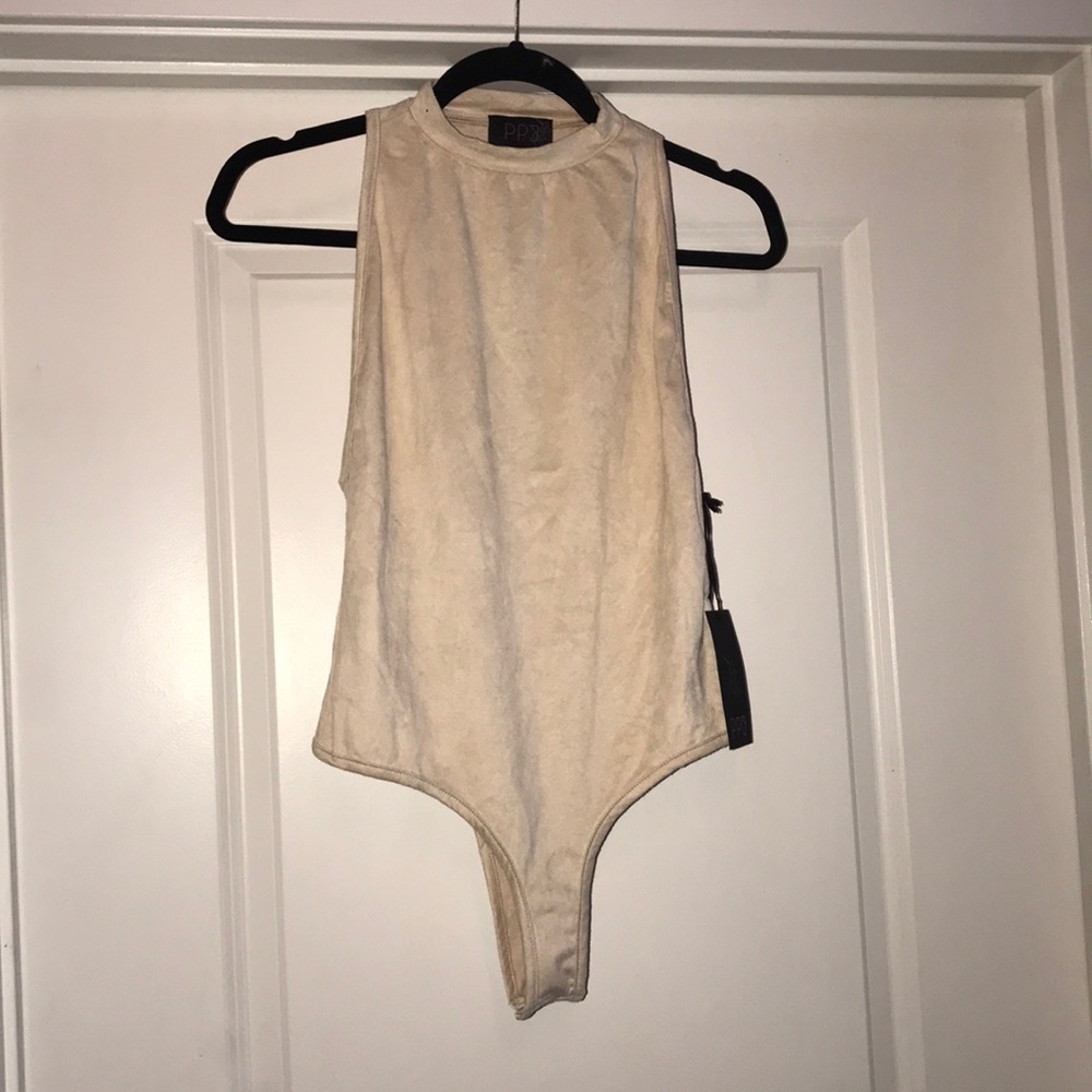 Cream, shade body suit.